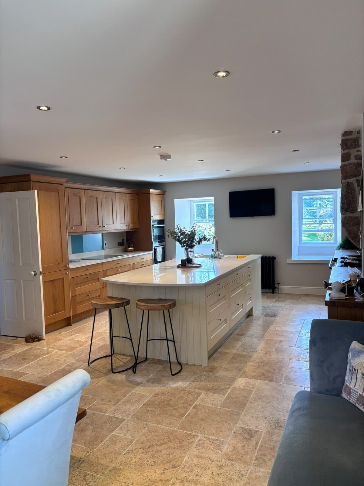 Before: oak shaker kitchen with cream island